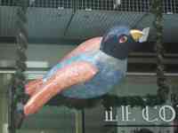 Sculpture of a sparrow with a comb