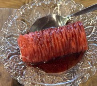 Ice cream is crisp pastry with cherry sauce